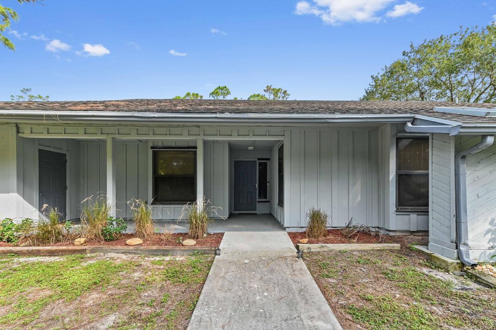 Photo of 14767 Snail Trail, Loxahatchee Groves, FL 33470 (MLS # R11136497)