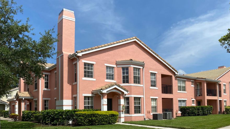 Excellently located & nicely kept 3b/2b/2 car garage condo. Spacious living and dining area; large windows provide ample natural light; Tile flooring throughout & plush carpet/vinyl in bedrooms. Kitchen has lots of cabinet space. Master bedroom with walk-in closet and direct access to a large covered balcony; master bath has a large roman tub with separate shower. Unit has a laundry room w/ washer & dryer. 1 assigned parking space. Beautifully landscaped and well-maintained gated community which offers a resort-style heated swimming pool & spa, fitness center, tennis court, multi-media room, valet trash service. Short walk away to restaurants, shopping, entertainment, Met's Stadium; 5 min drive to golf courses, Tradition, IRSC. Right off I-95