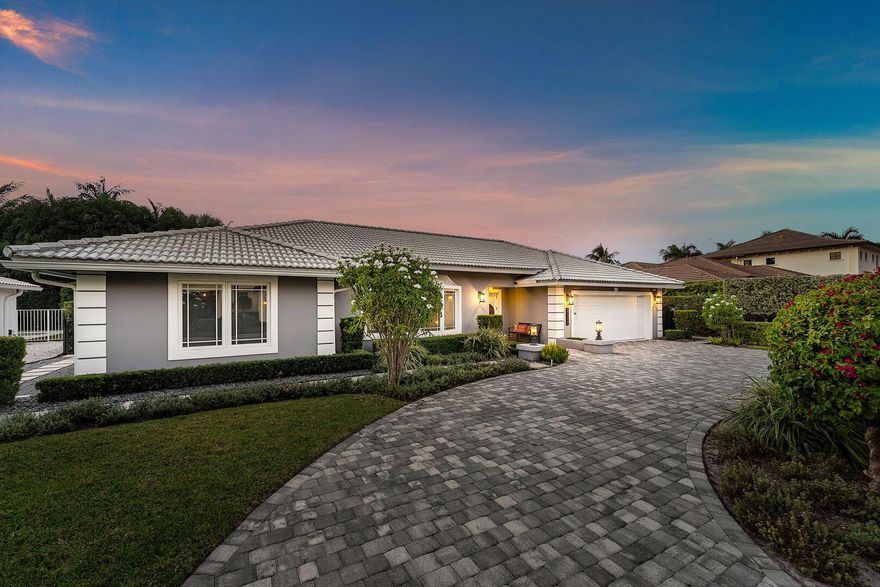 Experience refined living in this inviting one-story residence located in the prestigious Royal Palm Yacht & Country Club. This beautifully renovated home features a spacious split-bedroom layout with 4 bedrooms and 3 full baths. Formal living and dining rooms create an elegant arrival, while the separate family room offers a warm and comfortable space for gathering. The updated chef's kitchen stands on its own as a focal point, featuring top-tier stainless steel appliances and a large center island complete with an ice maker--perfect for effortless entertaining.The primary suite is a true sanctuary, offering a generous walk-in closet and a luxuriously appointed bathroom with a freestanding soaking tub, walk-in shower, and double-sink vanity. Designer details enhance every room,