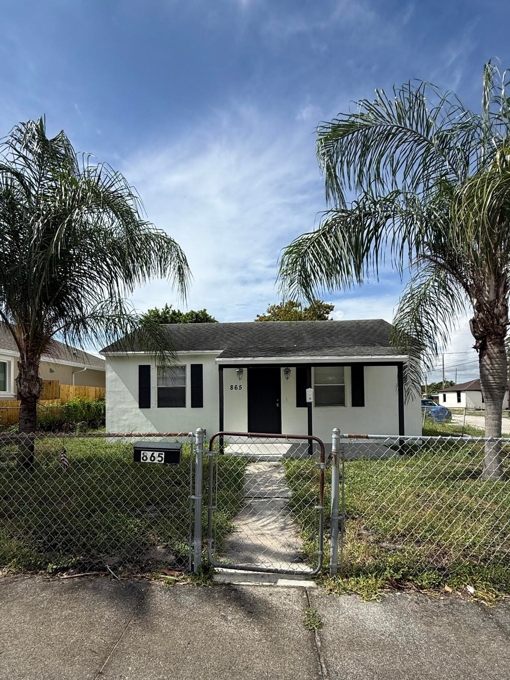 Photo of 865 W 3RD Street, Riviera Beach, FL 33404 (MLS # B26058914)