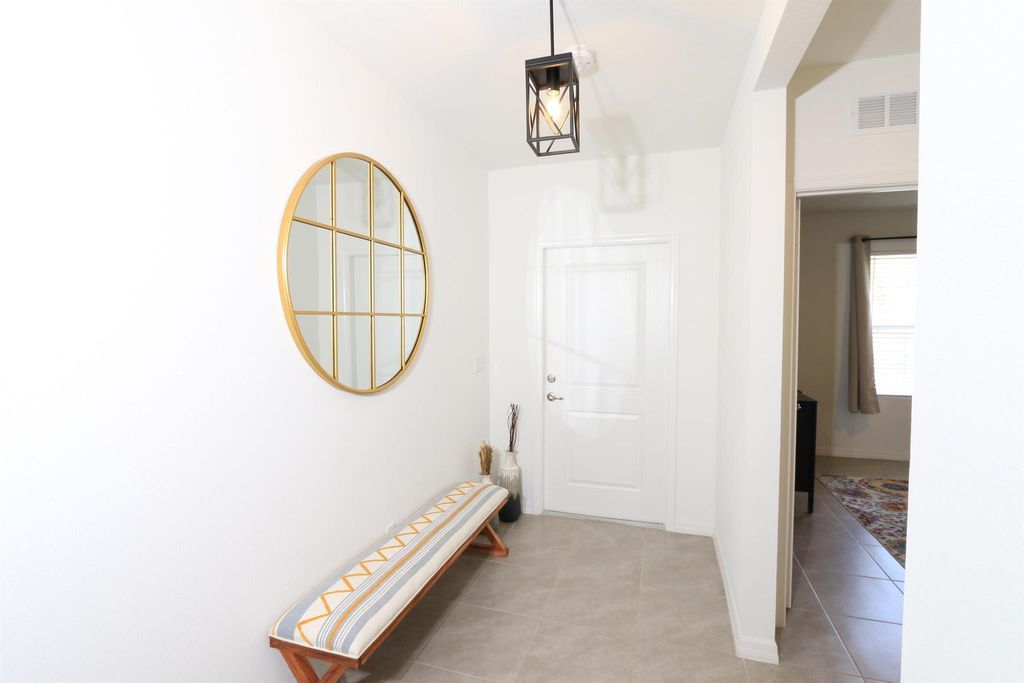 Photo of 1274 SW Marmore Avenue, Port Saint Lucie, FL 34953 (MLS # R11084589)