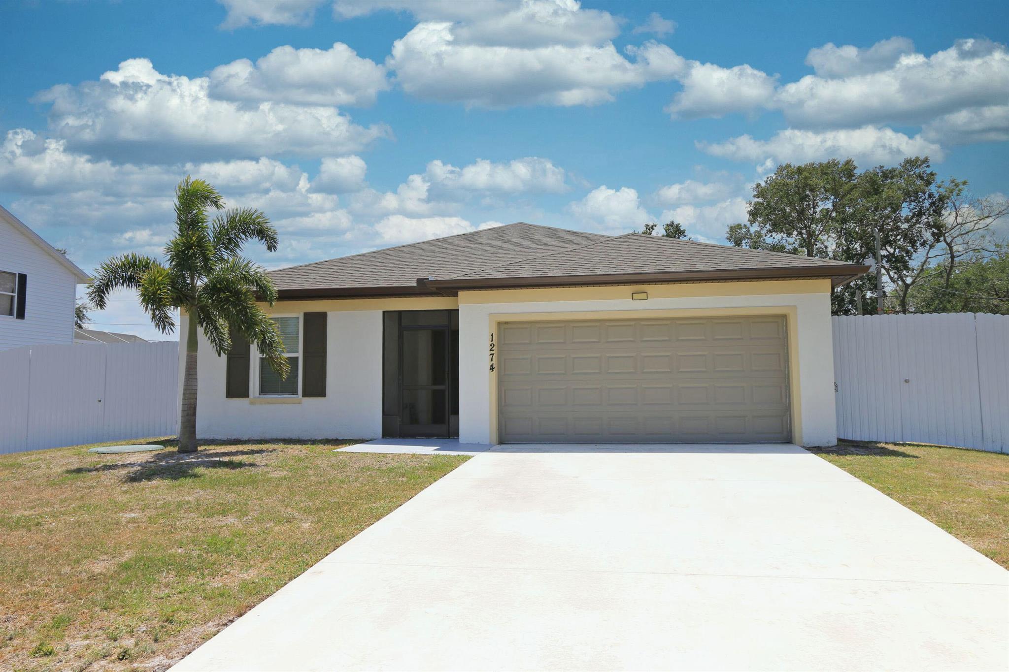 Welcome to your stunning dream home, built in 2022, nestled in the highly sought-after Savona area between Gatlin and Paar. This prime location offers unparalleled convenience with proximity to shopping, schools, parks, restaurants, and effortless access to I-95 and the turnpike for easy commuting. This exquisite 4-bedroom, 2-bath residence features a spacious layout with a 2-car garage, designed for both comfort and privacy in a split-plan arrangement. The large open-concept living area exudes elegance with stylish 17x17 inch tile throughout, centered around a beautifully appointed kitchen. The kitchen boasts white 36'' upper cabinets with soft-close doors and drawers, granite countertops, an oversized kitchen island, with Stainless Steel appliances.Curtains do not convey