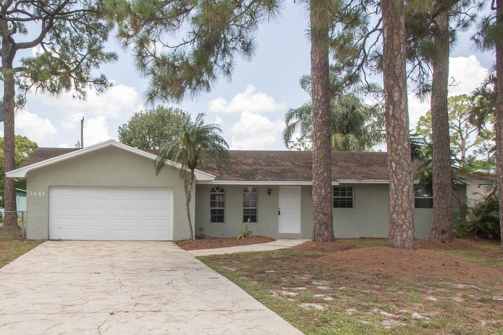 Photo of 3441 Southern Pines Drive, Fort Pierce, FL 34982 (MLS # R10949639)