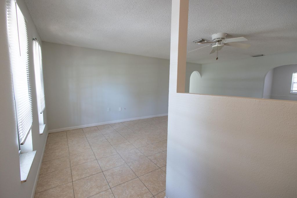 Photo of 3441 Southern Pines Drive, Fort Pierce, FL 34982 (MLS # R10949639)