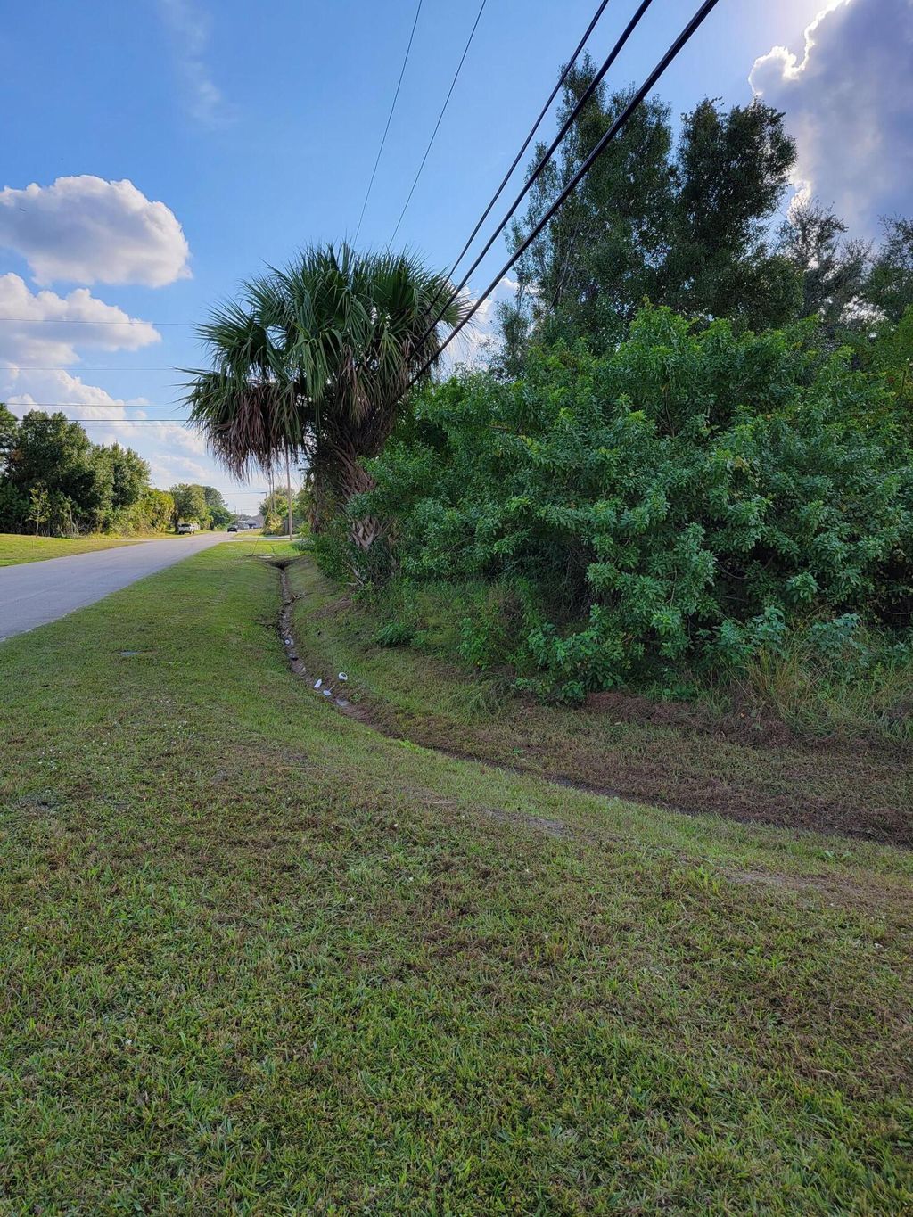 Photo of 4000 SW Hainlin Street, Port Saint Lucie, FL 34953 (MLS # R10767266)