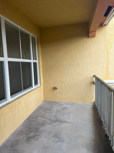 Photo of 3569 S FOREST HILL Boulevard #106, Palm Springs, FL 33406 (MLS # B26072954)