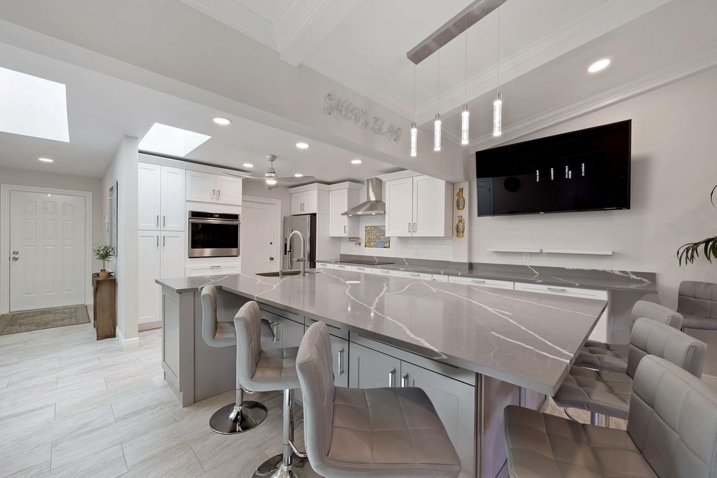 Photo of 7 Ridge Pointe Drive #C, Boynton Beach, FL 33435 (MLS # R11156395)