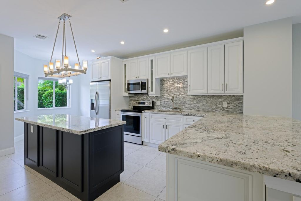Photo of 6817 Via Regina, Boca Raton, FL 33433 (MLS # B26029038)