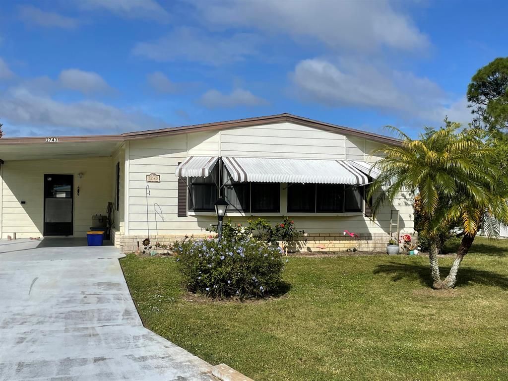 Photo of 2743 SW Monarch Trail Trl, Stuart, FL 34997 (MLS # R10759191)
