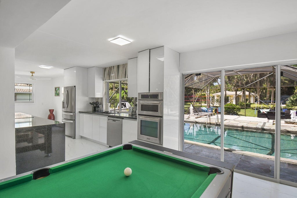 Photo of 12231 Areaca Drive, Wellington, FL 33414 (MLS # B26078706)