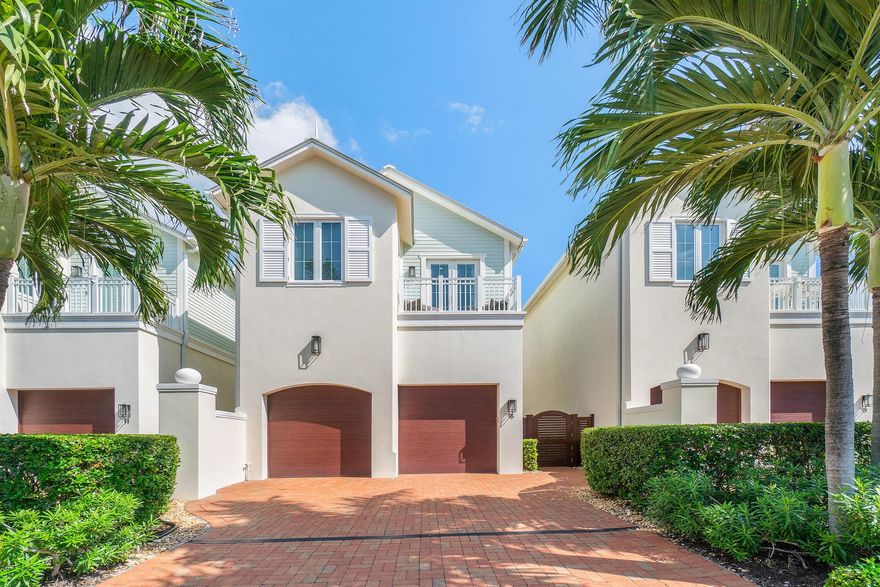 Experience coastal living at its finest in this thoughtfully designed Bermuda style townhome.  Steps away from the sand, nestled in the charming beachside town of Ocean Ridge, this 2015 custom built property features roughly 2,800 living sqaure feet, three bedrooms, three and a half baths, a spacious 2 car garage and comes with deeded beach access. The property was built to provide the utmost privacy, all while allowing ample natural light to flow through both the first, and second floor. Epitomizing the essence of beachside charm, 15 Adams seamlessly blends a Coastal and Bermuda design with top-tier technique & premium finishes. As you enter the property, you immediately can feel the open and lightness of the design. From the vaulted ceilings and custom woodwork, to the porcelain....