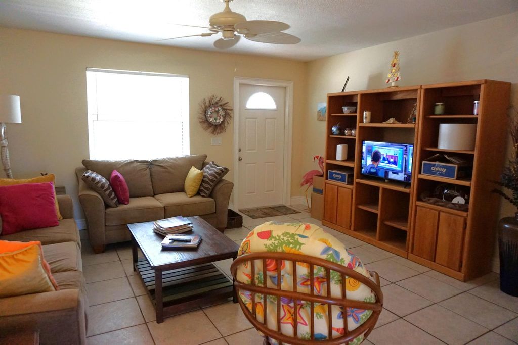 Photo of 1699 NE 23rd Terrace, Jensen Beach, FL 34957 (MLS # R11112706)