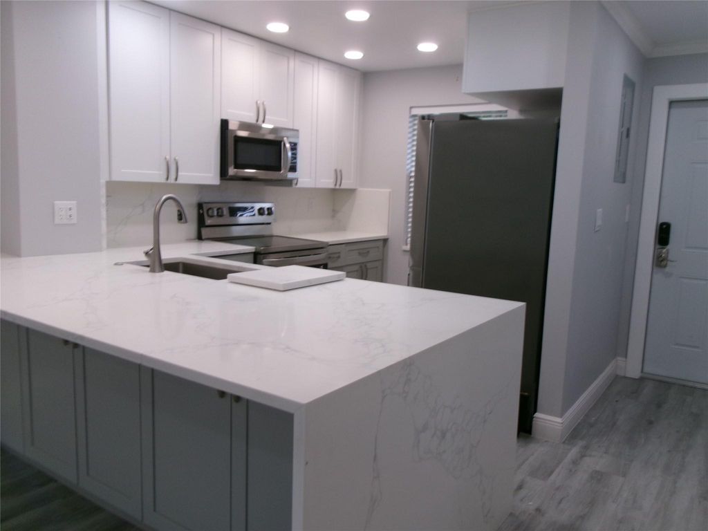 Photo of 9856 Marina Blvd #1314, Boca Raton, FL 33428 (MLS # F10532082)