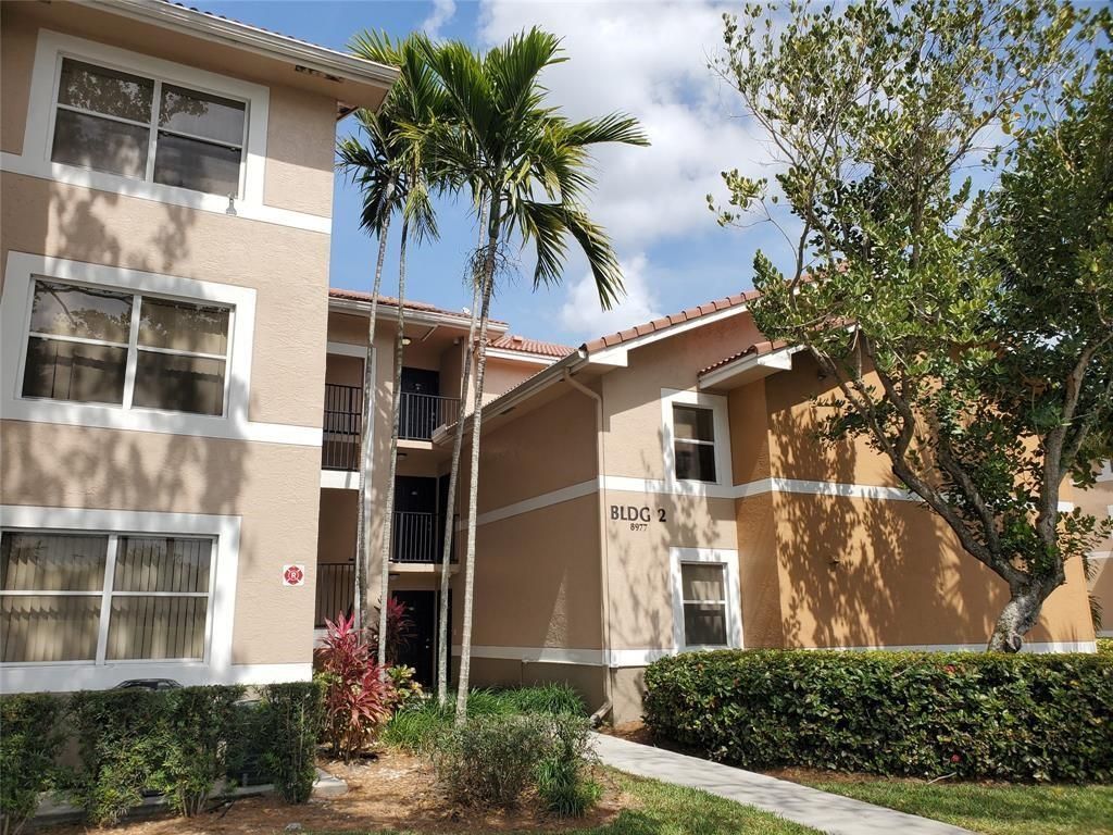 Photo of 8781 Wiles Road #202, Coral Springs, FL 33067 (MLS # F10499972)