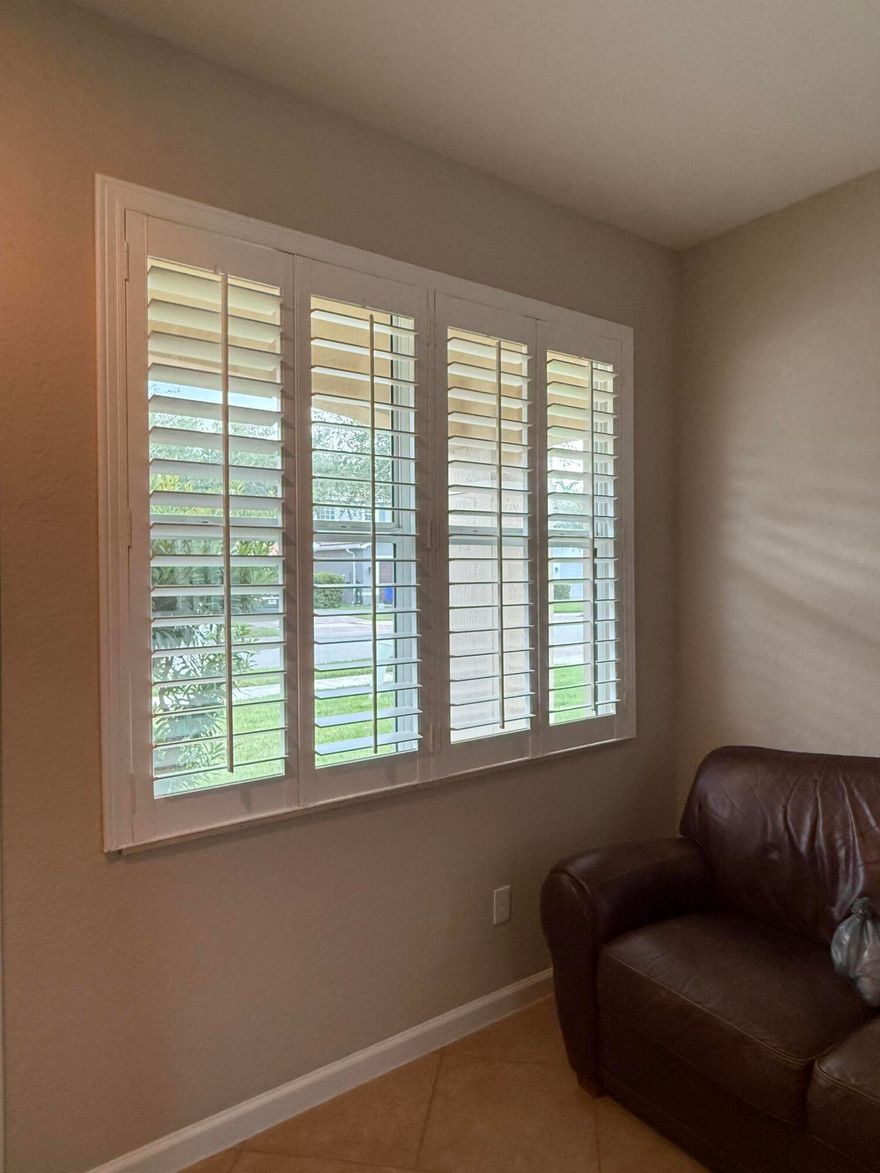 Beautiful two-story home featuring 5 spacious bedrooms and 3 full bathrooms, including one bedroom conveniently located on the first floor—perfect for guests or multi-generational living. There's truly room for everyone!  Located in desirable Palm City, within an A-rated school district, and offering easy access to major highways. Enjoy being just minutes from restaurants, shopping centers, and local parks.  All bedrooms feature solid wood flooring, adding warmth and elegance throughout the home.