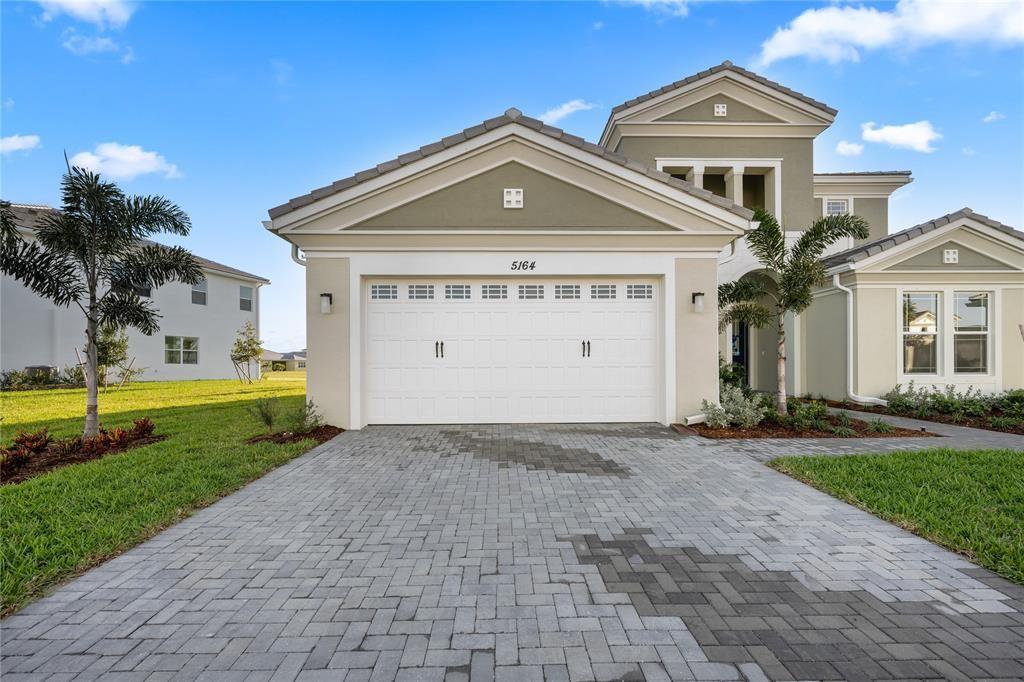 Incredible 5 bedroom 6.5 bathroom home brand new never been lived in new construction Home. Gourmet-style kitchen with quartz countertops and a Huge Center Island. Impact windows thru-out and a huge backyard with covered brick patio. Amazing Clubhouse with a huge outdoor patio and vacation-style amenities. Resort-style pool, Kids play zone, Bocce Ball, and top-of-the-line fitness Center.