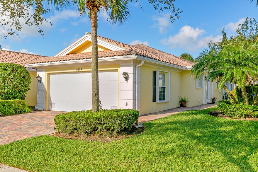 Updated and waiting for you! 2/2 villa walking distance to downtown Tradition shops, parks and restaurants. Tasteful updates: Luxury laminate and engineered wood floors through out, stainless steel appliances 2018, AC 2015, HWH 2020, Washer/Dryer 2020, accordion shutters, custom landscaping and private backyard patio, enclosed Florida room perfect for additional den/office, plantation shutters, new interior paint, large bedrooms with ensuite baths, walk-in closets, huge laundry room with laundry tub, lots of cabinets and pantry.  Move right in to this active community with newly remodeled clubhouse, 2 heated pools, fitness center, tennis, pickleball, 24 hr manned gated security and more!