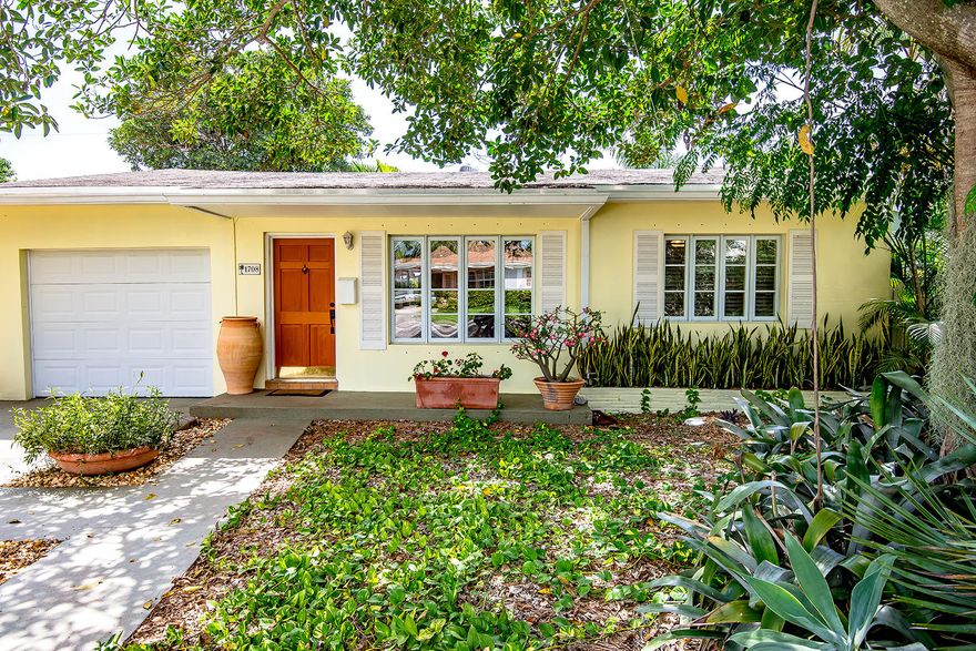 Charming Lake Worth cottage, beautifully landscaped with good-sized bedrooms. The home has impact windows, original wood floors & some tile (kitchen & dining). Washer & dryer in utility room, off of kitchen. Home is 2 bed & 2 bath, with a bonus room (den or office). Lovely additional features: in-laid book shelves in living area, crown molding throughout. Pristine original tile in baths, pays homage to its mid-century era.