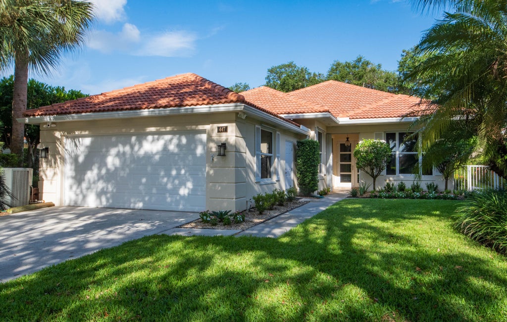 Photo of 447 Kelsey Park Drive, Palm Beach Gardens, FL 33410 (MLS # B26046796)