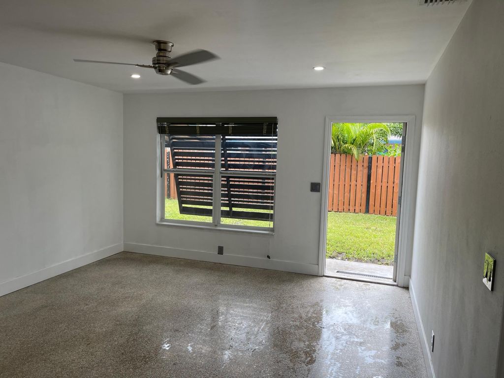 Photo of 975 NE 40th Street #A, Oakland Park, FL 33334 (MLS # F10486373)