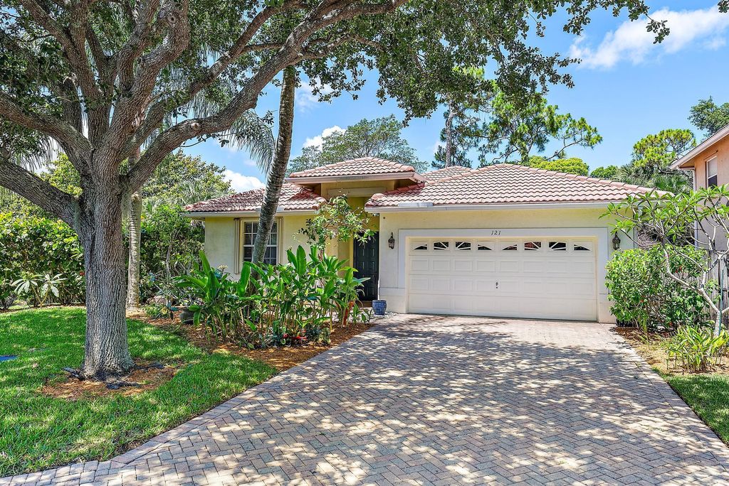 Photo of 121 Hidden Hollow Drive, Palm Beach Gardens, FL 33418 (MLS # R10990517)