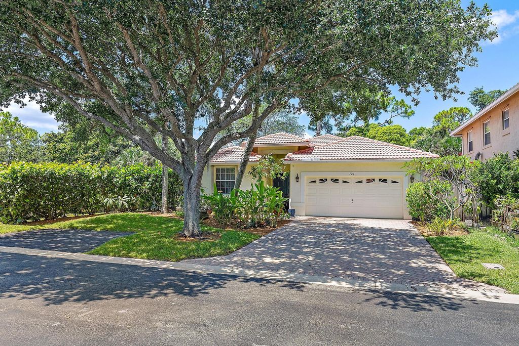 Photo of 121 Hidden Hollow Drive, Palm Beach Gardens, FL 33418 (MLS # R10990517)