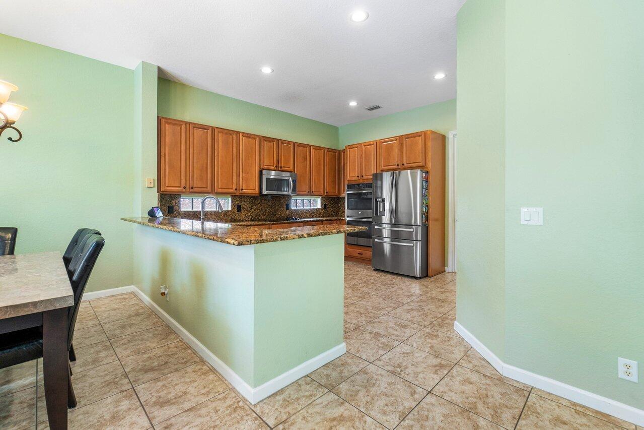 Photo 5 of 22 of 4304 Pomelo Boulevard house