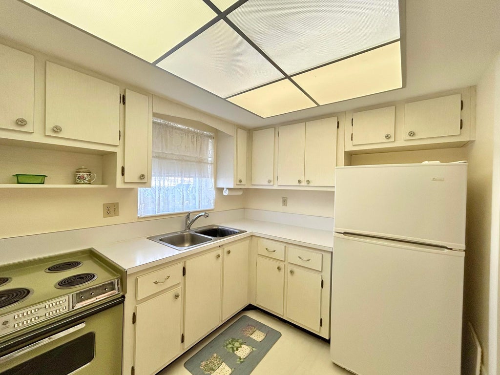 Photo of 2955 Crosley Drive W #F, West Palm Beach, FL 33415 (MLS # B26094594)