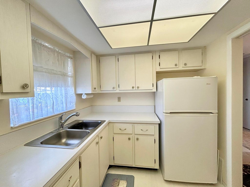 Photo of 2955 Crosley Drive W #F, West Palm Beach, FL 33415 (MLS # B26094594)