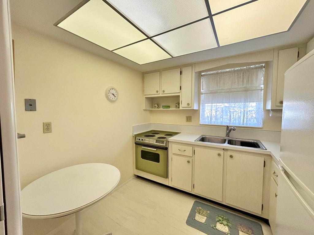 Photo of 2955 Crosley Drive W #F, West Palm Beach, FL 33415 (MLS # B26094594)