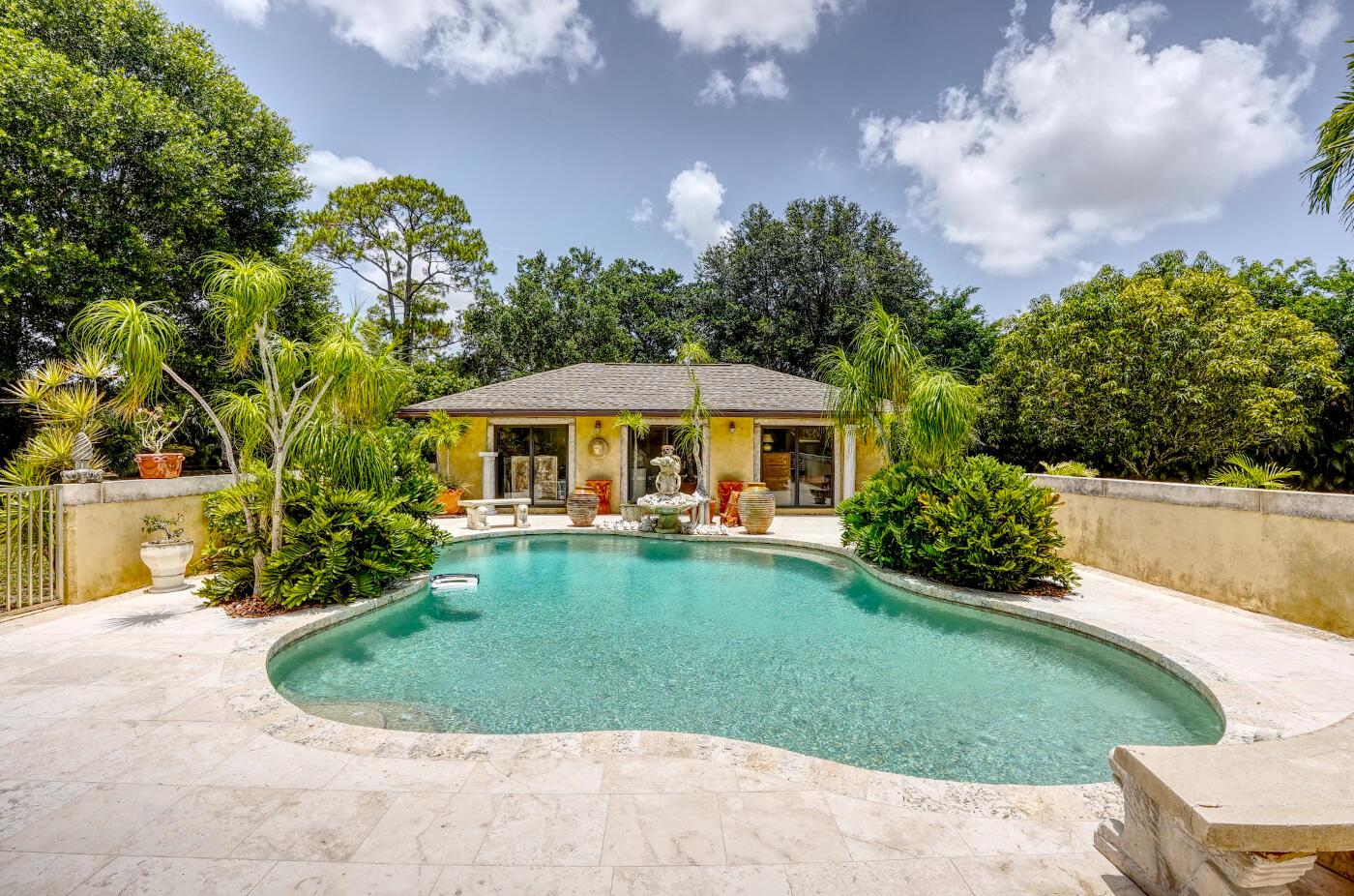 Spacious 4-Bedroom Home on 2.5 Fully Fenced Acres - No HOA!Tucked away on a quiet dead-end street, this rare gem offers privacy, space, and endless possibilities. This solid CBS 4-bedroom, 4 bath home features a large covered patio--perfect for entertaining--and is complemented by a stunning 1,000 sq ft pool cabana ready for your dream outdoor oasis.The property includes a massive 1,200 sq ft detached garage with two overhead doors, ideal for car enthusiasts, workshop use, or storage. Need more? There's also a man cave/barn setup with 2 horse stalls and extra storage, ideal for equestrians or hobbyists.With no HOA restrictions, you're free to bring all your boats, trailers, campers, and toys. The multi-family potential makes this a truly flexible property.