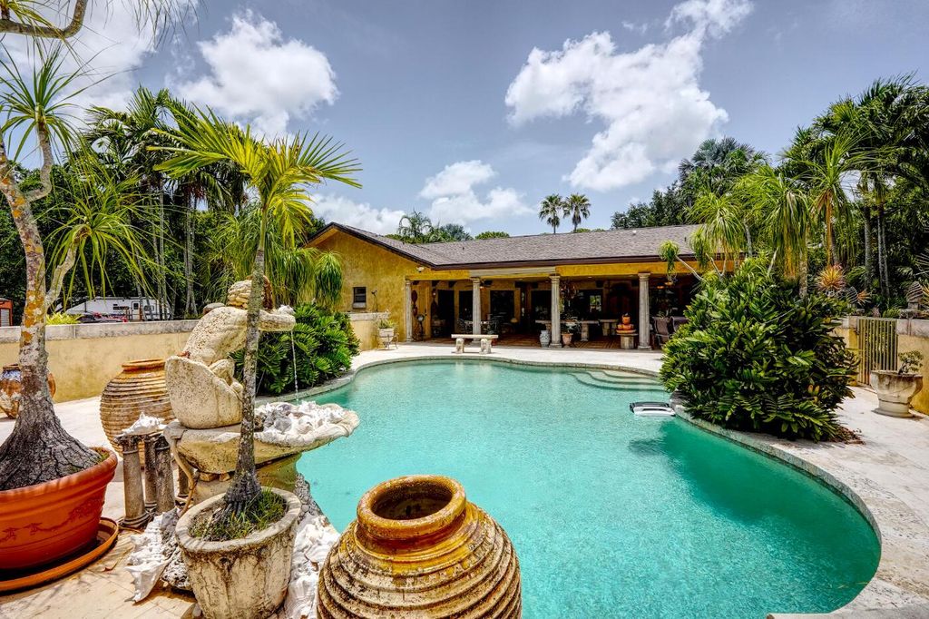 Photo of 6725 Katherine Road, West Palm Beach, FL 33413 (MLS # R11105916)