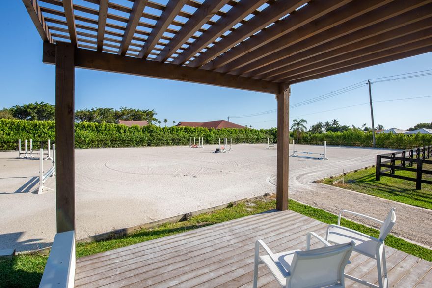 9 stall barn walking distance to the horse show available for off season or annual! Perfectly positioned just a 7-minute hack to the showgrounds the thoughtfully designed equestrian amenities include two immaculate barns housing 9 stalls, a tack room, feed room, fly spray system, laundry, three wash stalls, full bathroom, office/lounge, and six irrigated paddocks-perfectly suited to meet your training and turnout needs. The newly renovated fully furnished turnkey private 4-bedroom home with a pool is also available at $15,000 per month for off season. Don't miss this rare opportunity to lease this exquisite property in a prime location!