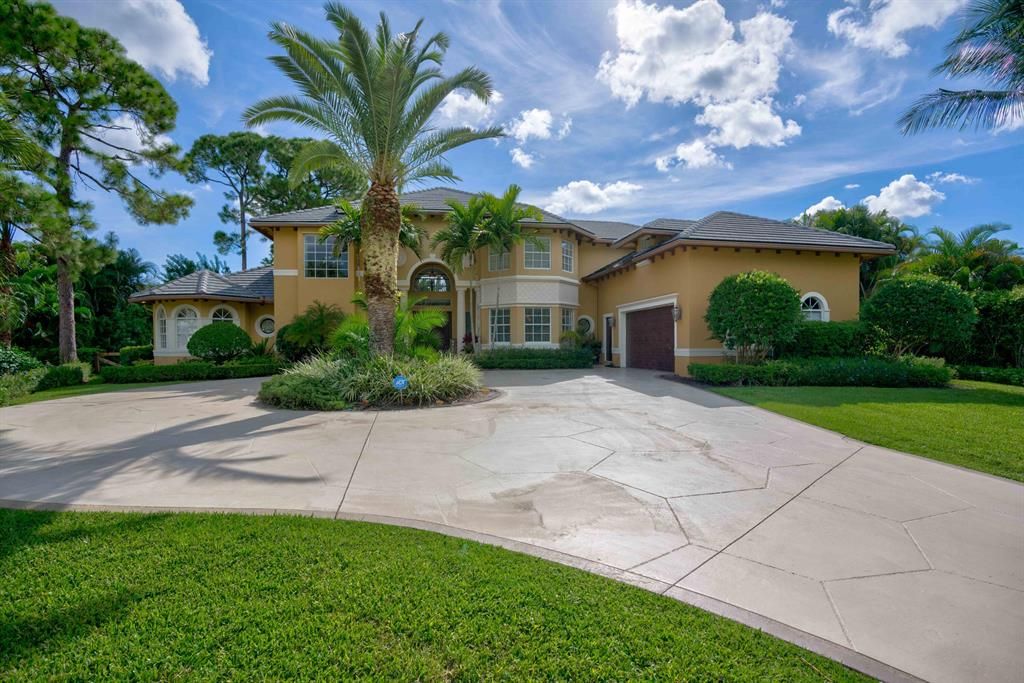 Photo of 5169 Misty Morn Road, Palm Beach Gardens, FL 33418 (MLS # R10830279)