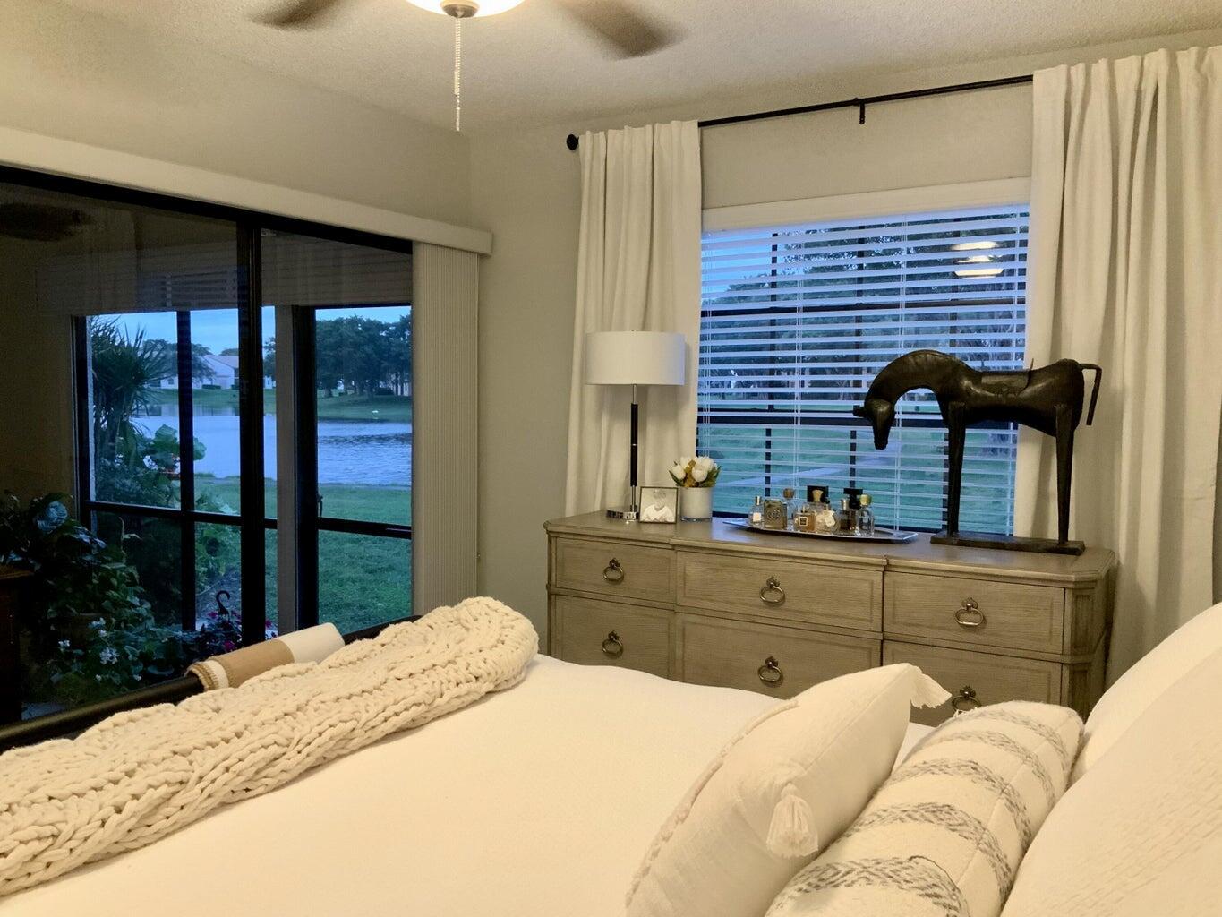 Boca Raton's best kept secret!! TOTALLY Remodeled with Smart Home appliances and features. This gorgeous 2/2 is on the lake and includes water and sewer! You will love coming home to the views, amenities, and lake life! Great landlord as well. Pets considered on a case by case basis. Located in East Boca's highly desirable 24 hour manned gated community, Windwood, located East of 95, approx 1.5 mile from the beach. It boasts a huge lake where you can kayak, walk, bike, and relax. There are 2 pools, tennis courts, basketball courts, outdoor racquetball, dog park, picnic area, car wash and more! Hurry! Won't last!! *Farmhouse wood and black chandelier does not convey.