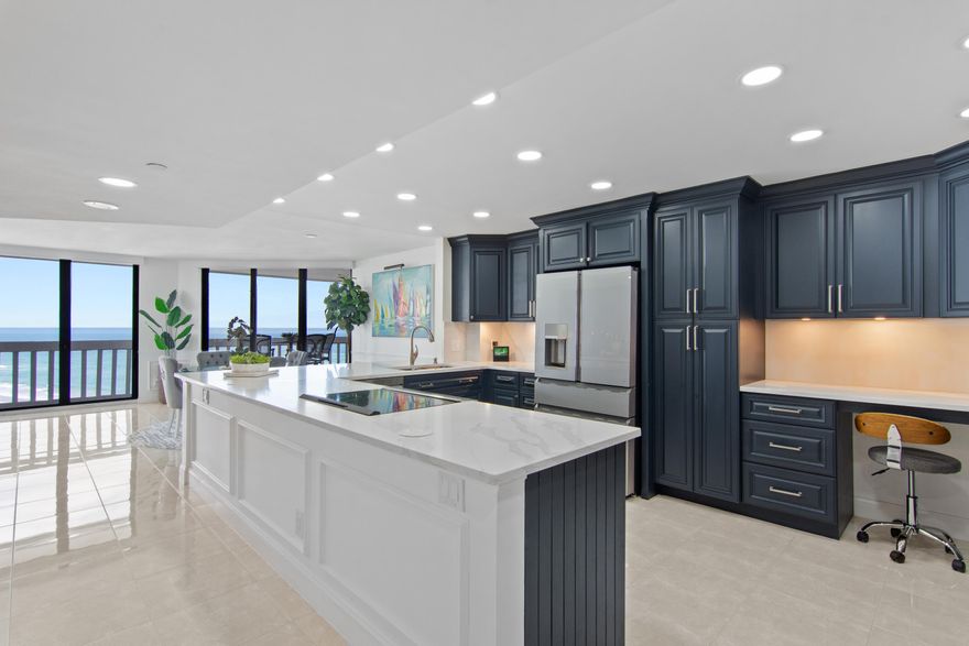 COME AND SEE this beautifully UPDATED 10th story OCEANFRONT condominium on Hutchinson Island!  This home has it all!  Enjoy ocean views and intracoastal views from the living room!  Kitchen includes induction range, quartz countertops, new appliances!  Tankless water heater and instant hot water in the kitchen! Solid wood doors throughout, full size washer and dryer, ALEXA compatible throughout! Balcony has full accordion shutters. Schedule your private showing today, you won't want to leave!