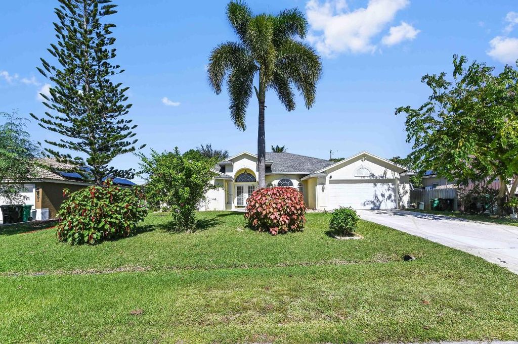 Photo of 681 SW Saragossa Avenue, Port Saint Lucie, FL 34953 (MLS # R11139354)