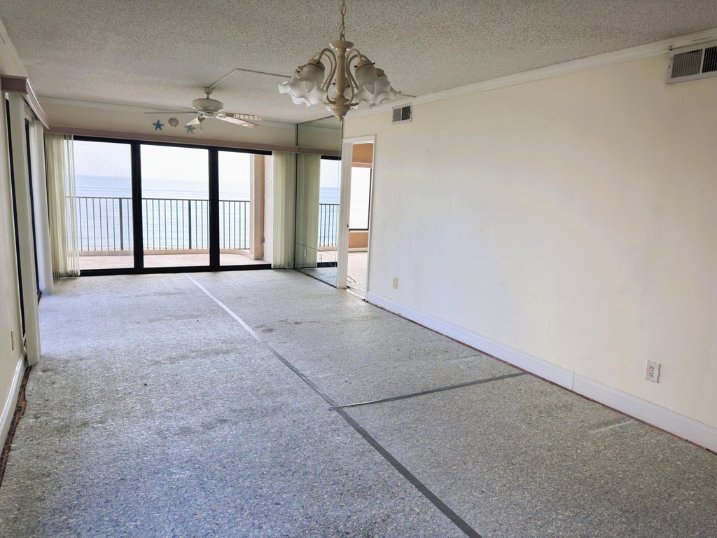 Photo of 10310 S Ocean Drive #301, Jensen Beach, FL 34957 (MLS # B26044216)