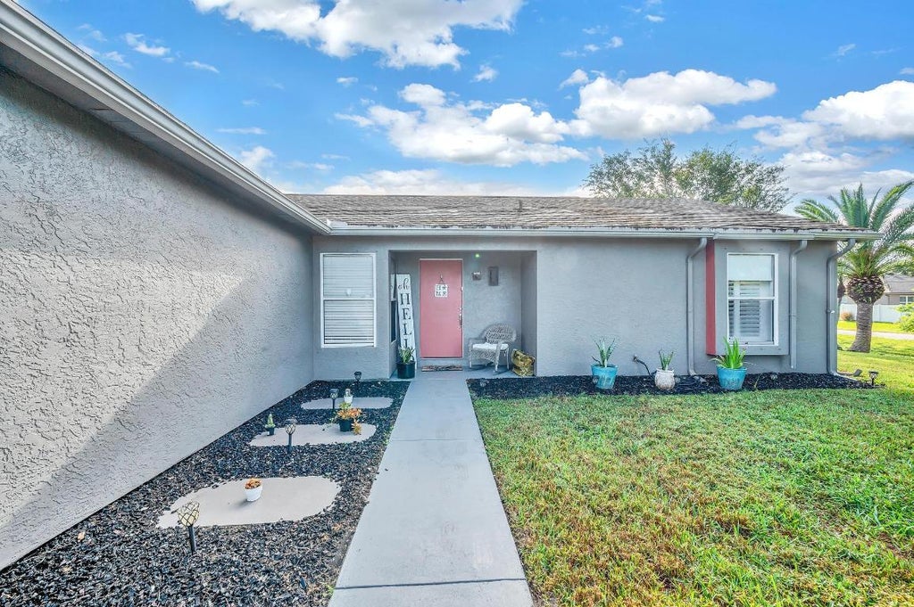 Photo of 3197 SW Esperanto Street, Port Saint Lucie, FL 34953 (MLS # R10935932)