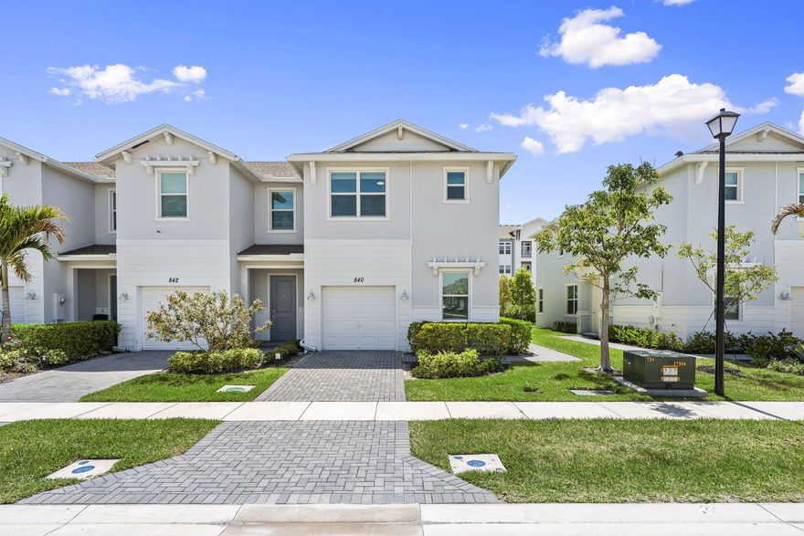 Built in 2023, this well maintained 3 bedroom, 2.5 bathroom corner unit in Veranda Landing offers light and bright living with impact glass, a modern open layout, and added privacy from the corner unit location. Residents enjoy access to the community pool while being within walking distance to The Shoppes at Veranda Falls with shopping, dining, grocery stores, and a gym just moments away. Conveniently located with quick access to both I-95 and the Florida Turnpike, this move-in ready home offers the perfect combination of comfort, convenience, and low maintenance living in one of Port St. Lucie's fastest growing areas.