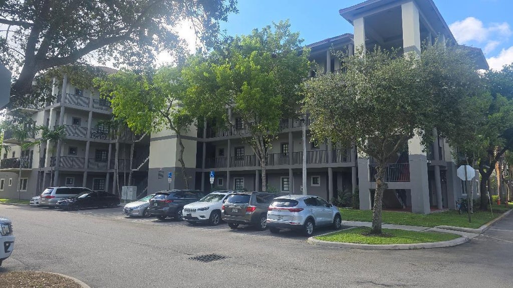 Photo of 2851 RIVERSIDE Drive #303-N, Coral Springs, FL 33065 (MLS # B26072218)