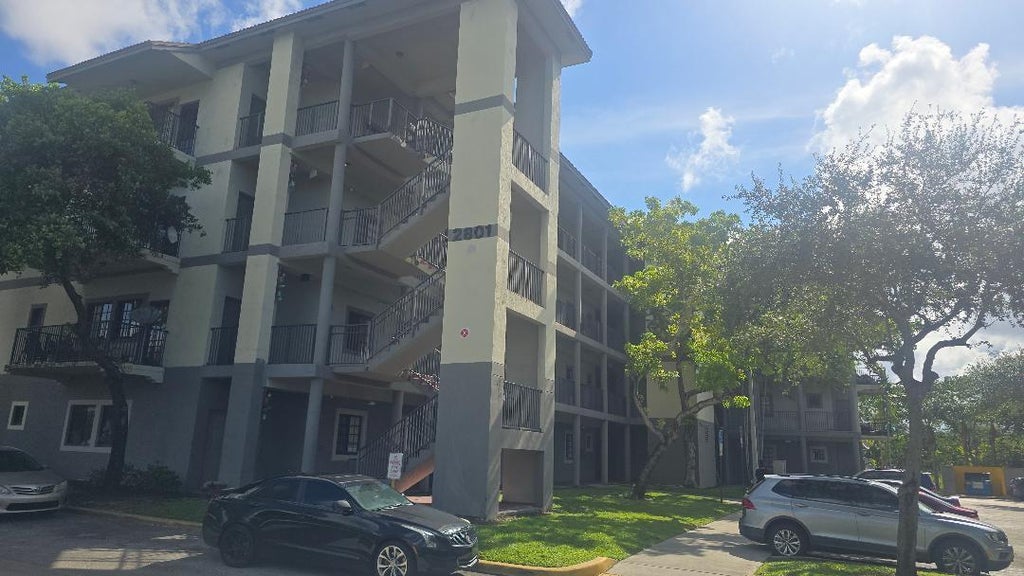 Photo of 2851 RIVERSIDE Drive #303-N, Coral Springs, FL 33065 (MLS # B26072218)