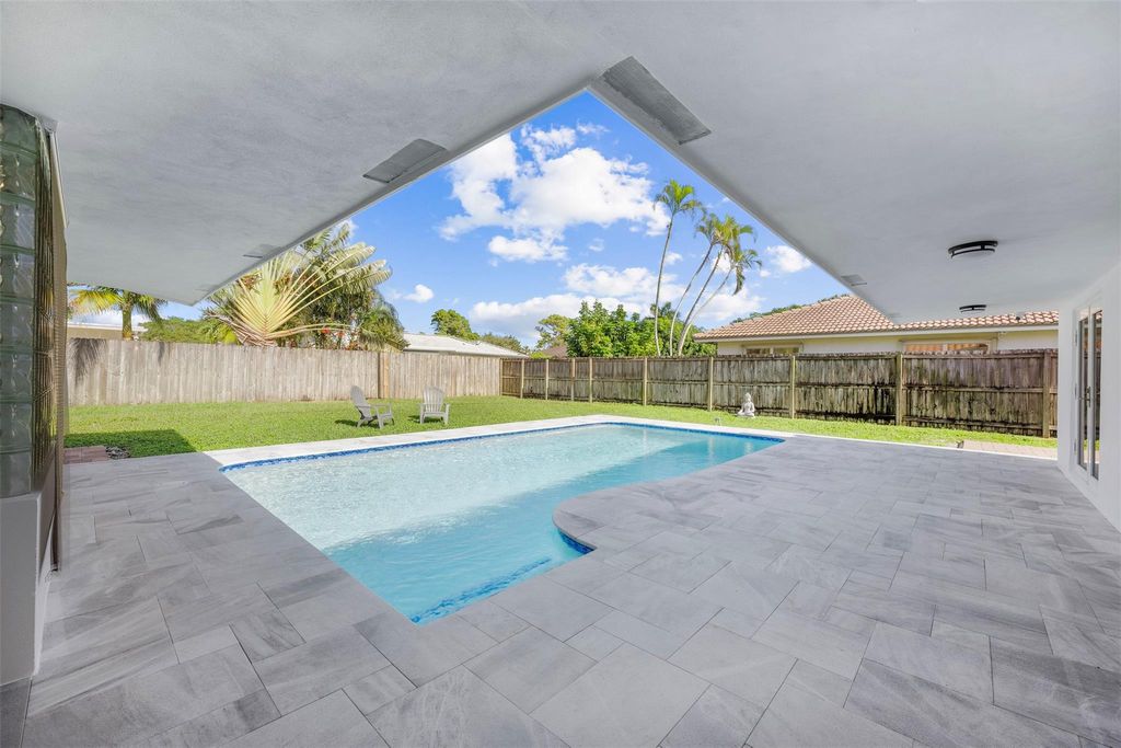 Photo of 1051 NW 9th Street, Boca Raton, FL 33486 (MLS # F10484248)