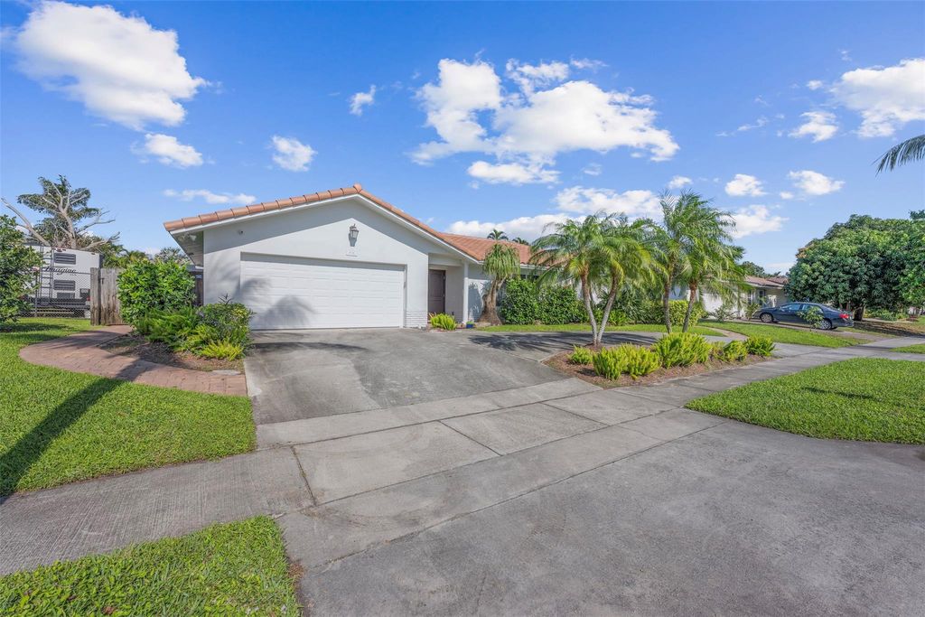 Photo of 1051 NW 9th Street, Boca Raton, FL 33486 (MLS # F10484248)