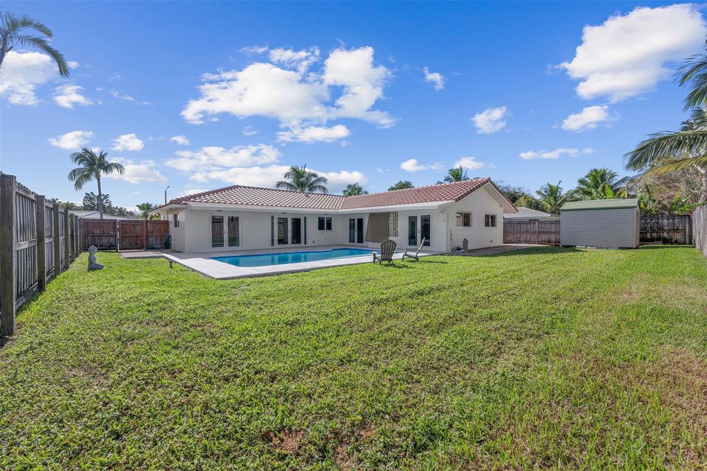 Photo of 1051 NW 9th Street, Boca Raton, FL 33486 (MLS # F10484248)