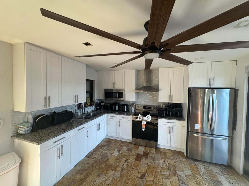 Photo of 429 SANTA ANNA Drive, Palm Springs, FL 33461 (MLS # B26066088)