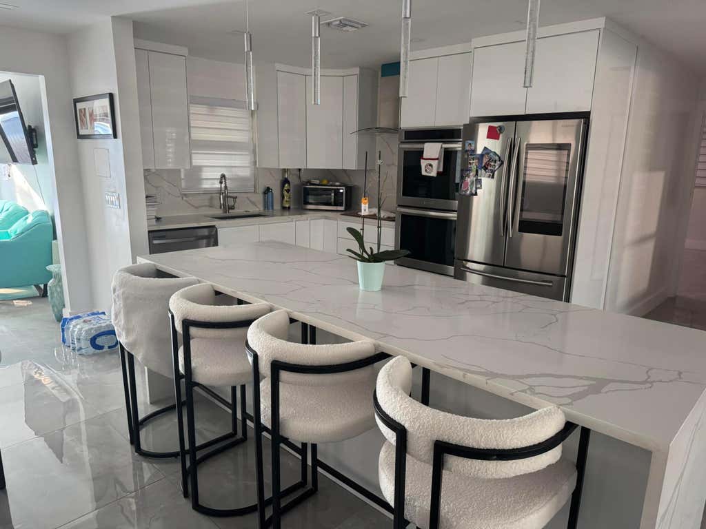 Photo of 429 SANTA ANNA Drive, Palm Springs, FL 33461 (MLS # B26066088)