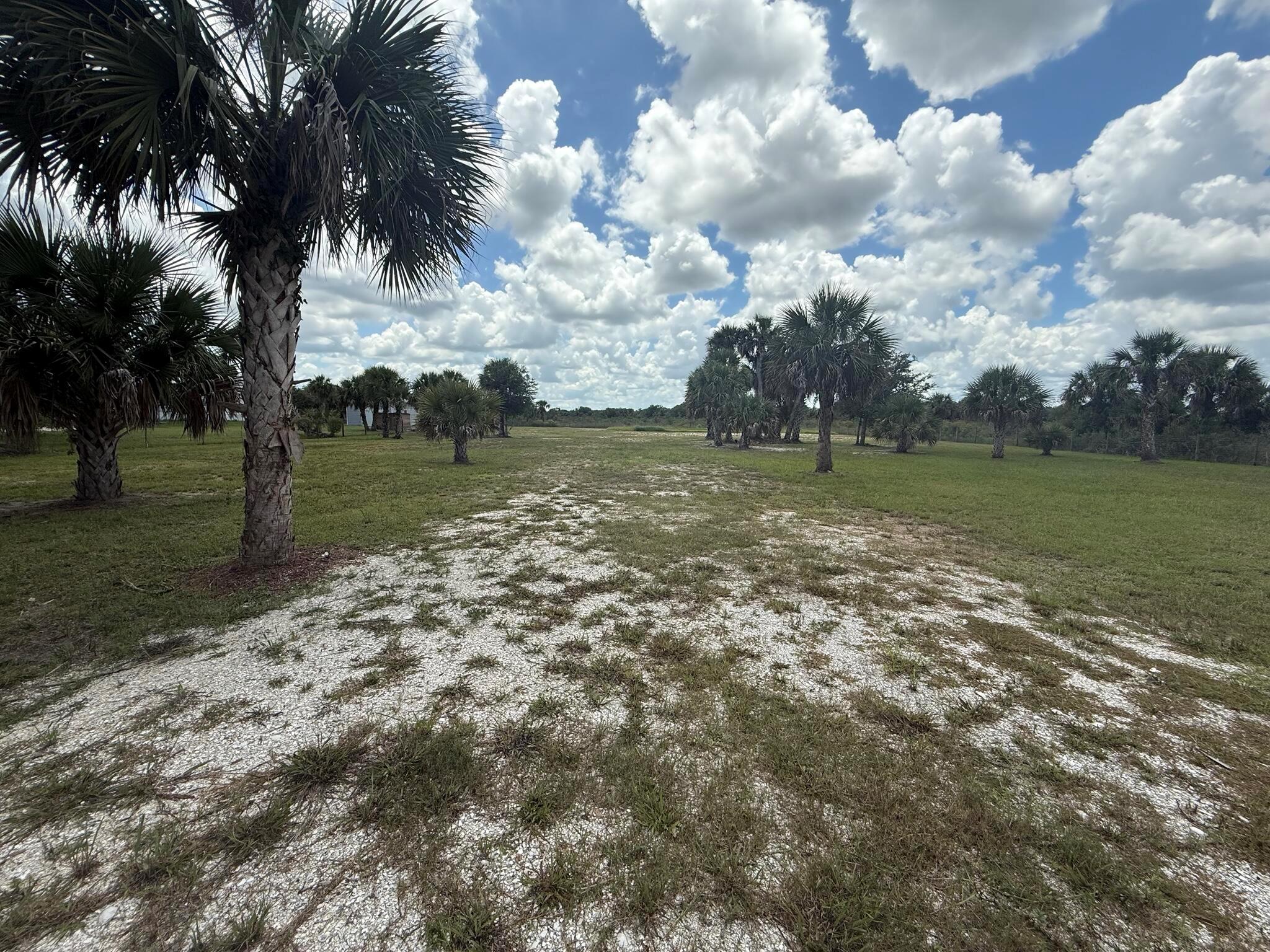 Build or bring your mobile and barn to this spacious 1.25-acre lot sits just off the main dirt road, offering both privacy and easy access. The property is already cleared, fully fenced, and equipped with a gate and culvert, with power poles on the street making it simple to connect to electricity. Enjoy the best of Florida's outdoors with nearby attractions such as Kissimmee River Preserve State Park and the legendary Lake Okeechobee, renowned for world-class fishing. With no HOA and no restrictions, you have the freedom to bring your animals, start a farm, or create your dream rural escape. Whether your vision includes fishing, hunting, agriculture, or simply soaking up the peace and privacy of the countryside, Okeechobee County offers the perfect backdrop for your plans.