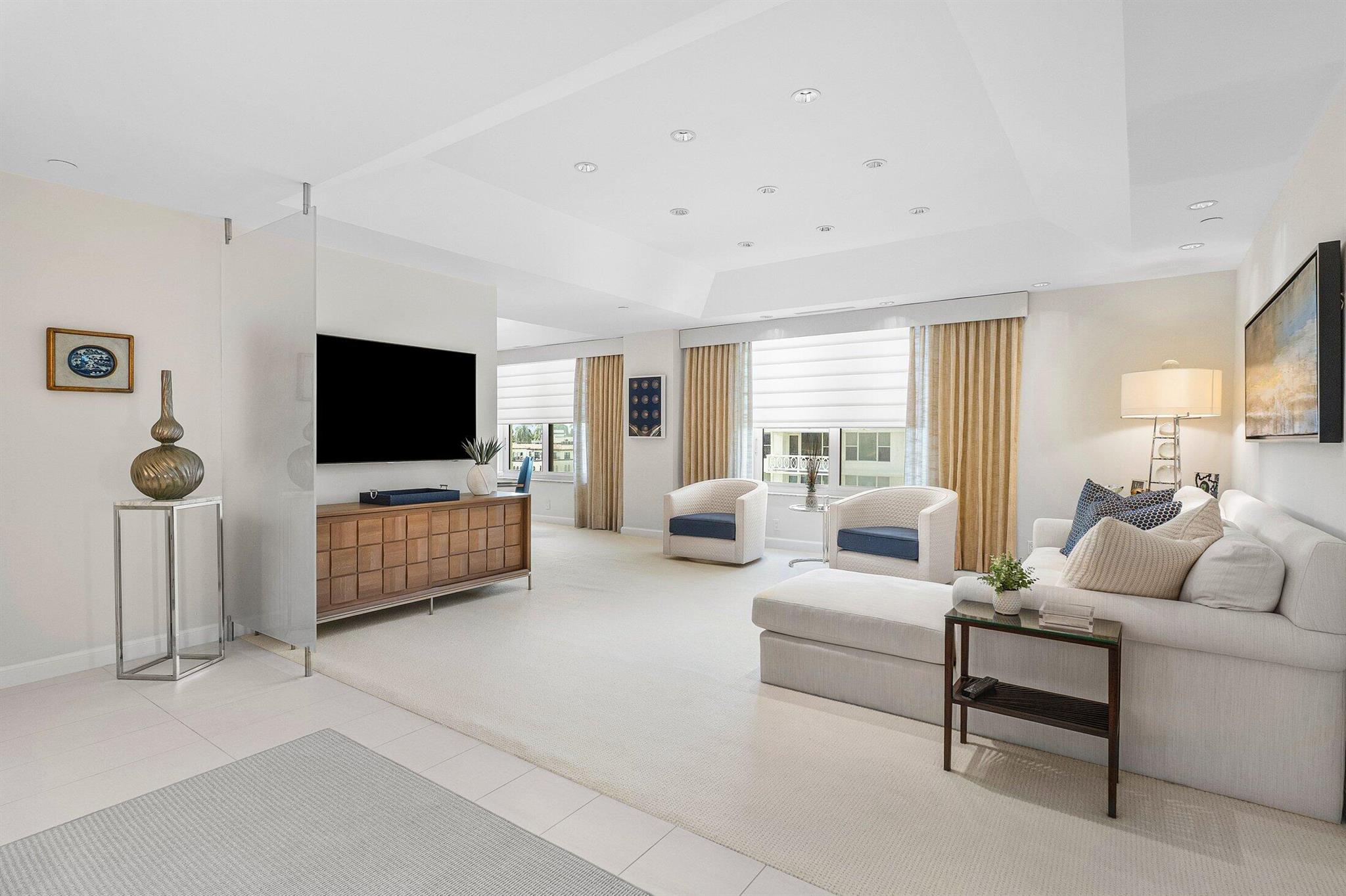 Experience effortless in-town living in this beautifully renovated and furnished 2 bedroom, 2 en-suite bath residence located in the sought after PB Biltmore. With direct, sweeping views of the Intracoastal Waterway, this tastefully appointed residence features a spacious layout, open kitchen with top appliances, motorized window treatments, abundant custom storage, and a dedicated laundry room. Newly renovated full service building w/ 24/7 security, doorman, valet parking, resort-like pool, tennis, fitness center, on-site marina, lake trail access, and a private beach club complete with shuttle service for your convenience. A unique offering all in a prime, walkable in-town location. 2 car parking and Pets Permitted!