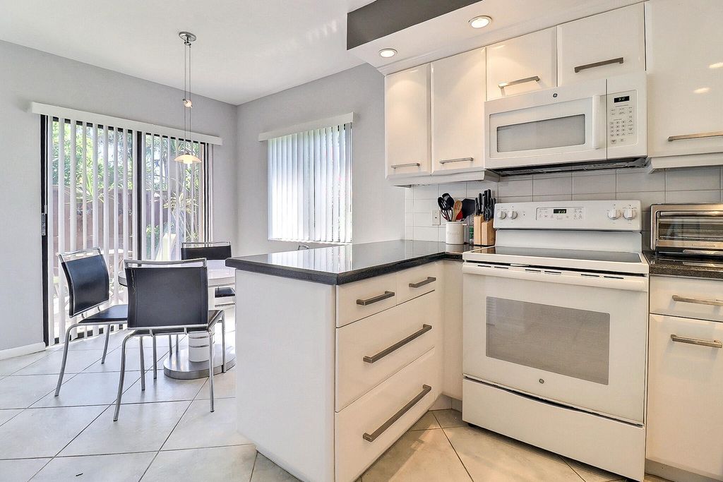 Photo of 5172 S Fountains Dr Drive S, Lake Worth, FL 33467 (MLS # B26026604)